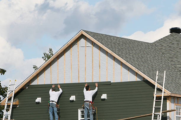 Professional Siding technician working in New Cumberland, PA